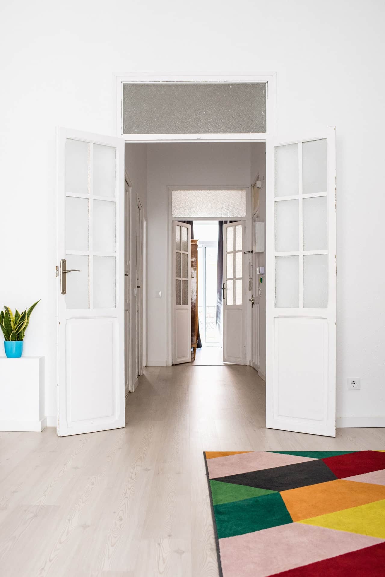 Large white open plan home with bi-fold doors