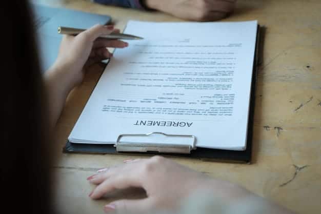 bank officers discussing customers sign contract