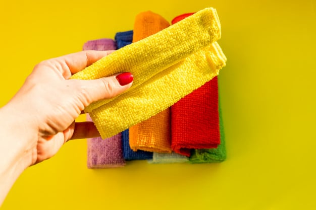 housekeeper-holding-cleaning-dry-microfiber-cloth-cleaning