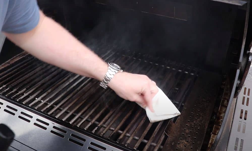 the final step of the barbeque grill cleaning process