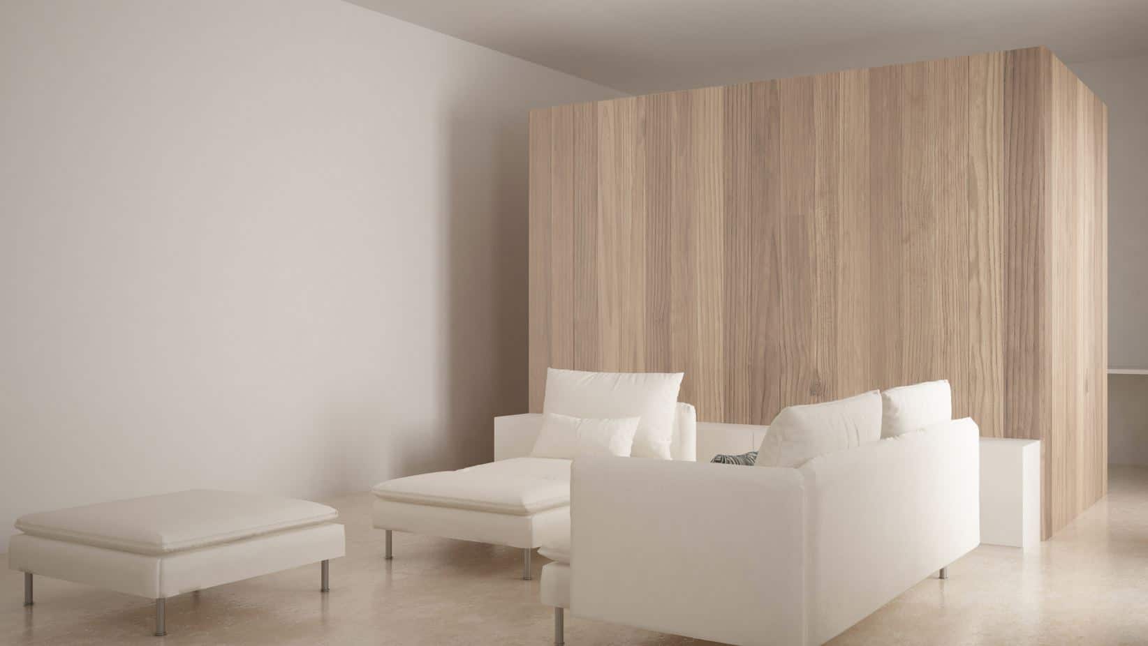 modern white inspired living room with two large couches and a futon on a travertine floor