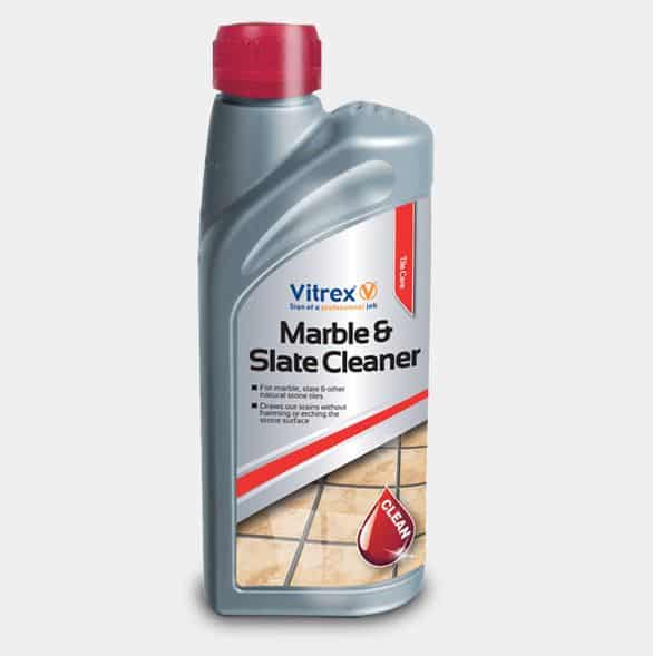 a bottle of vitrex marble and slate cleaner on a grey background